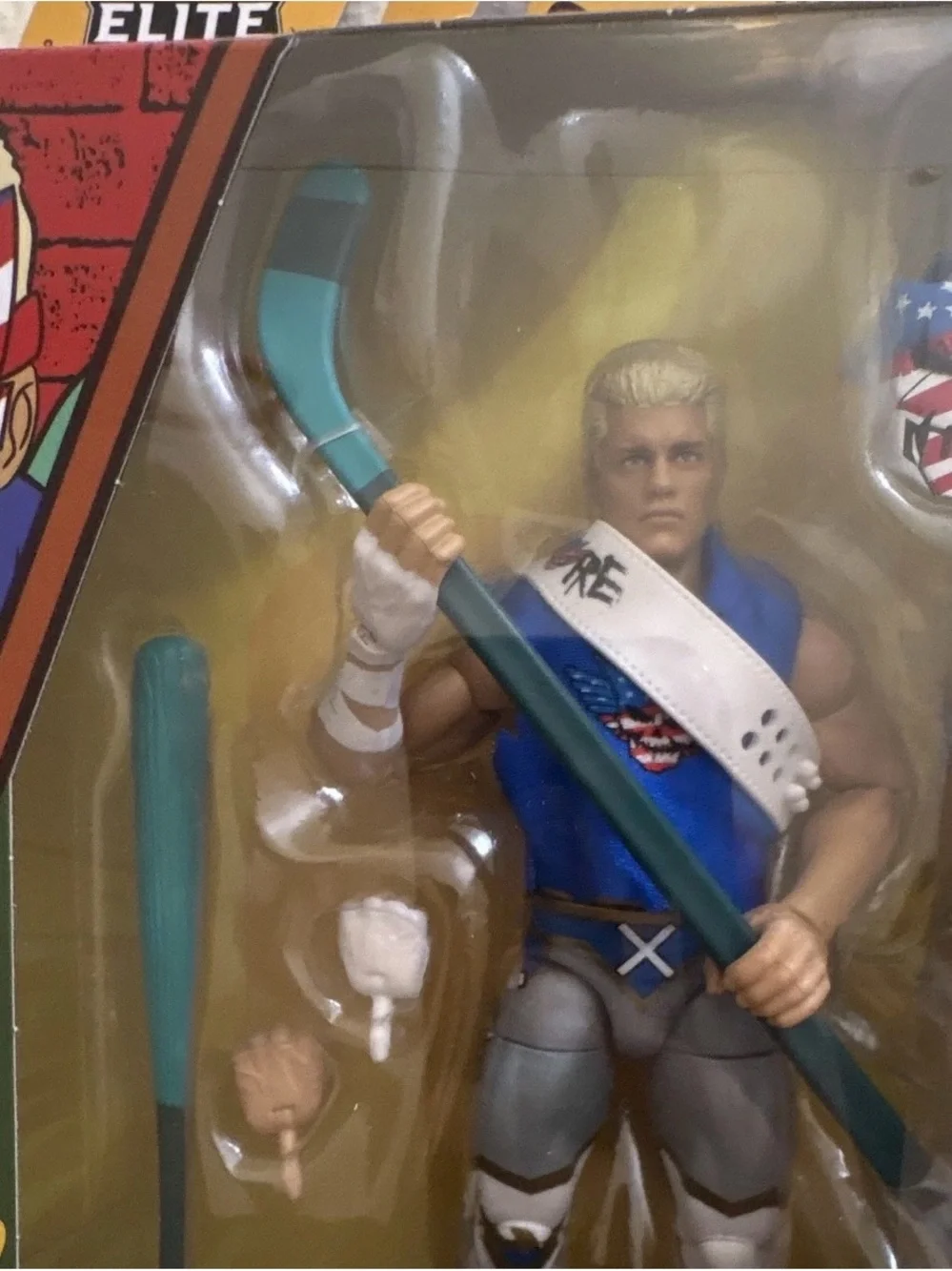 WWE Cody Rhodes Action Figure in Blue and Gray with Teal Accessory